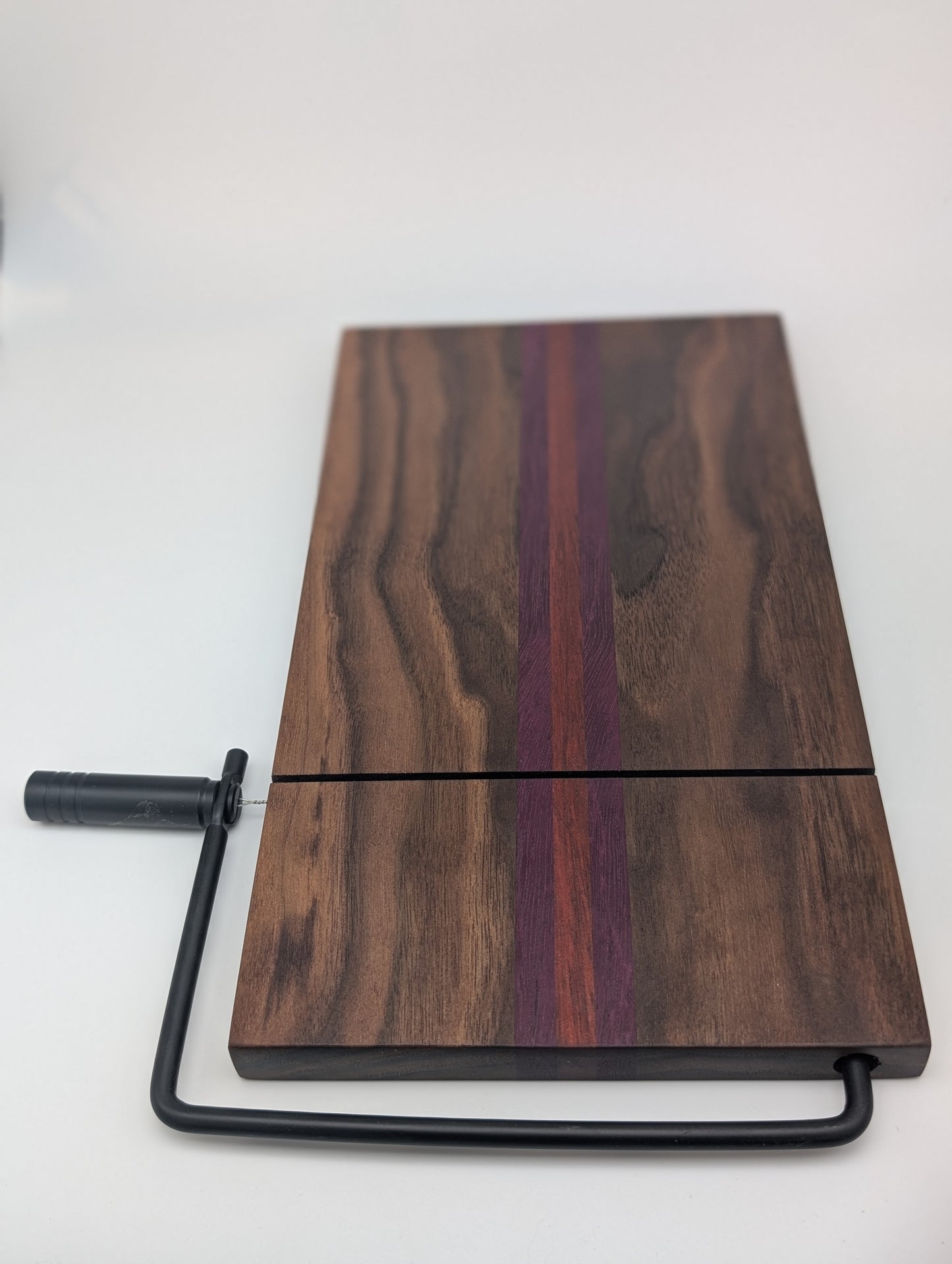 Handcrafted Cheese Slicer Board – Padauk, Purpleheart & Walnut with Matte Black Hardware