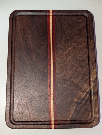 Walnut Paduak and Maple cutting board