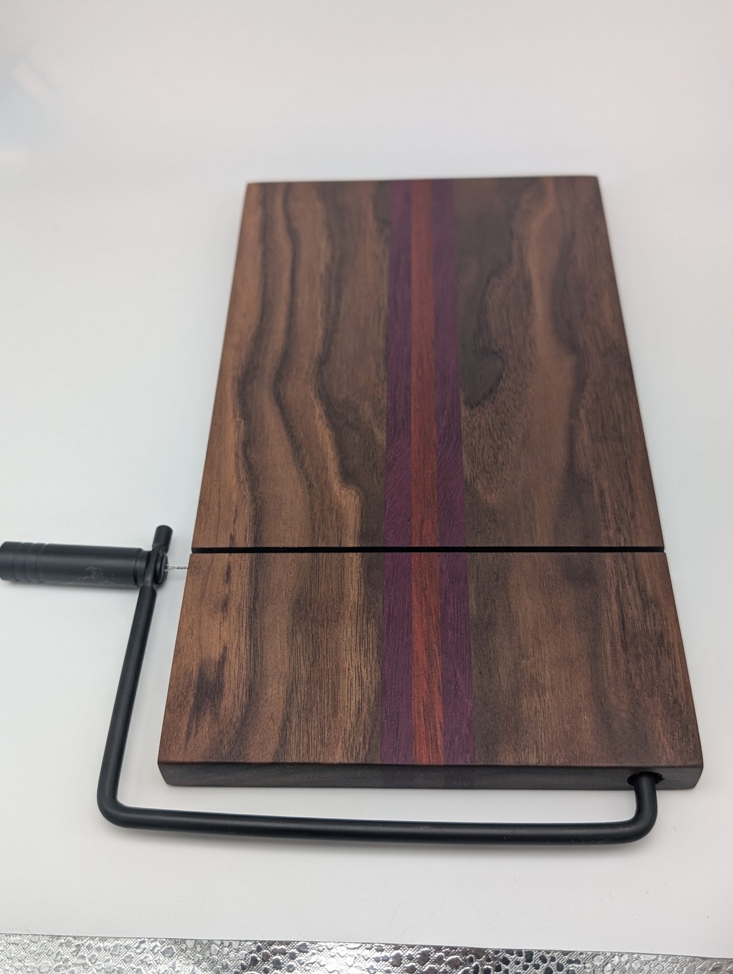 Handcrafted Cheese Slicer Board – Padauk, Purpleheart & Walnut with Matte Black Hardware